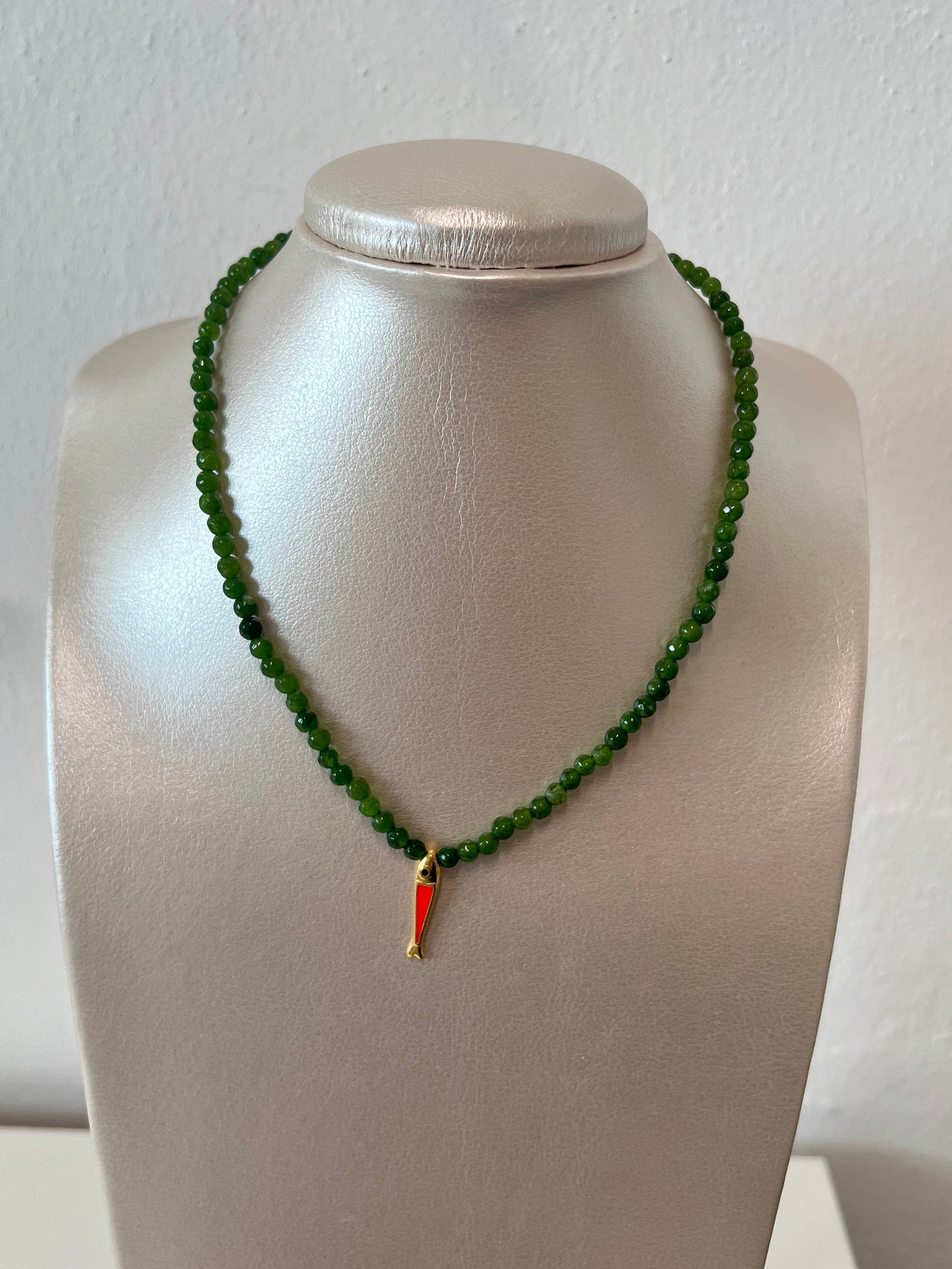 Green jade necklace with fish pendant