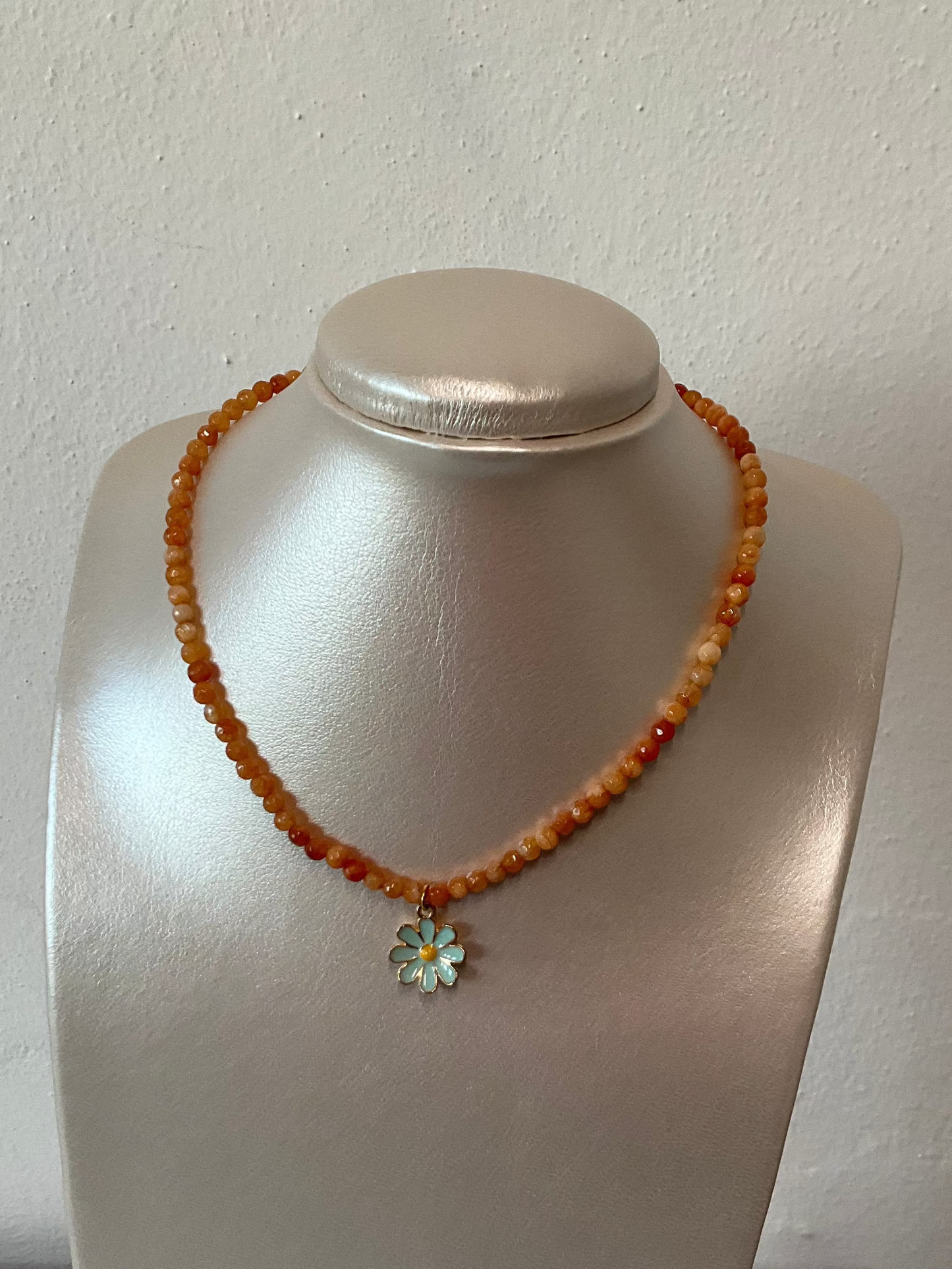 Orange jade with flower pendant
