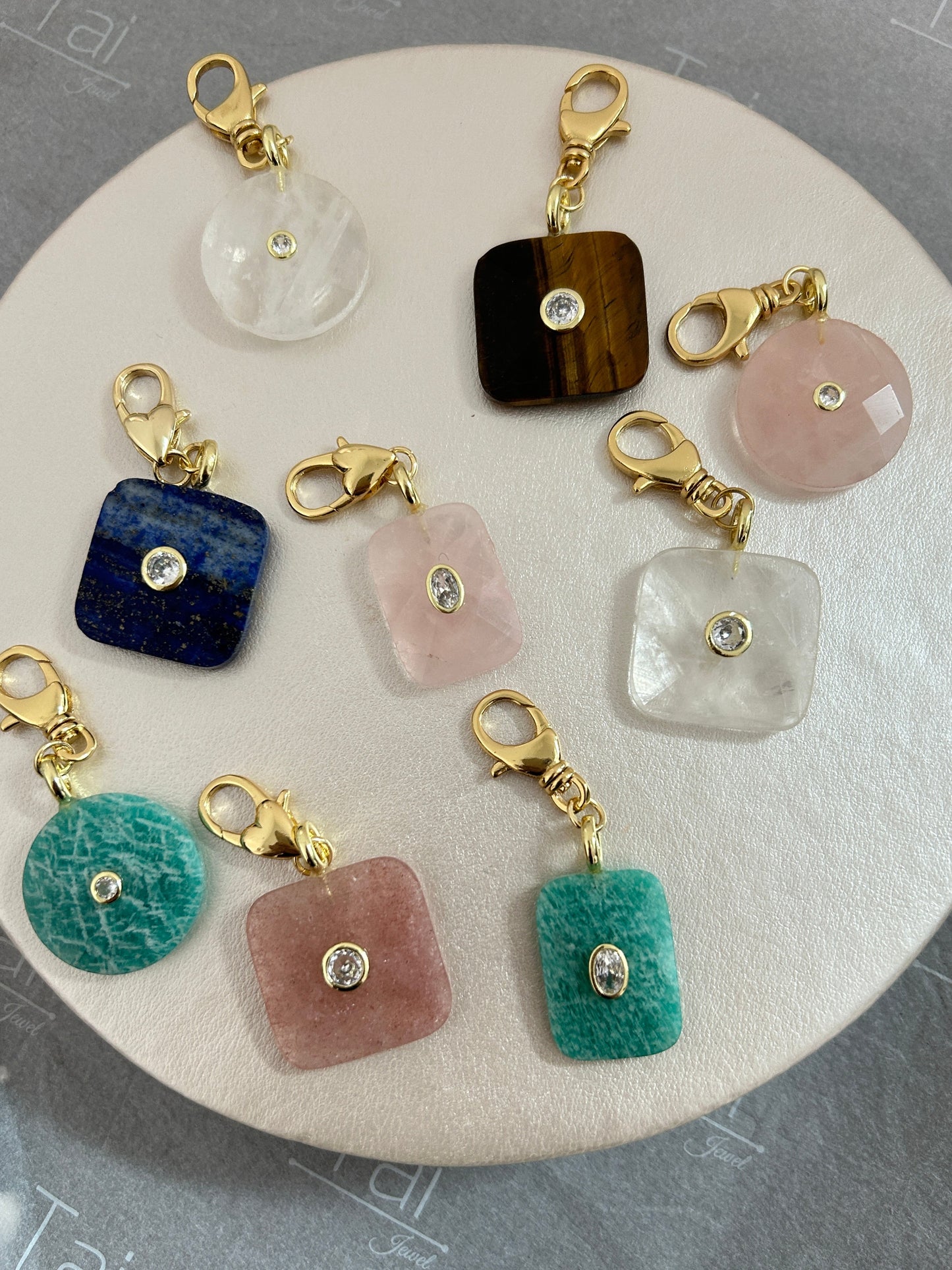 Different stone charms