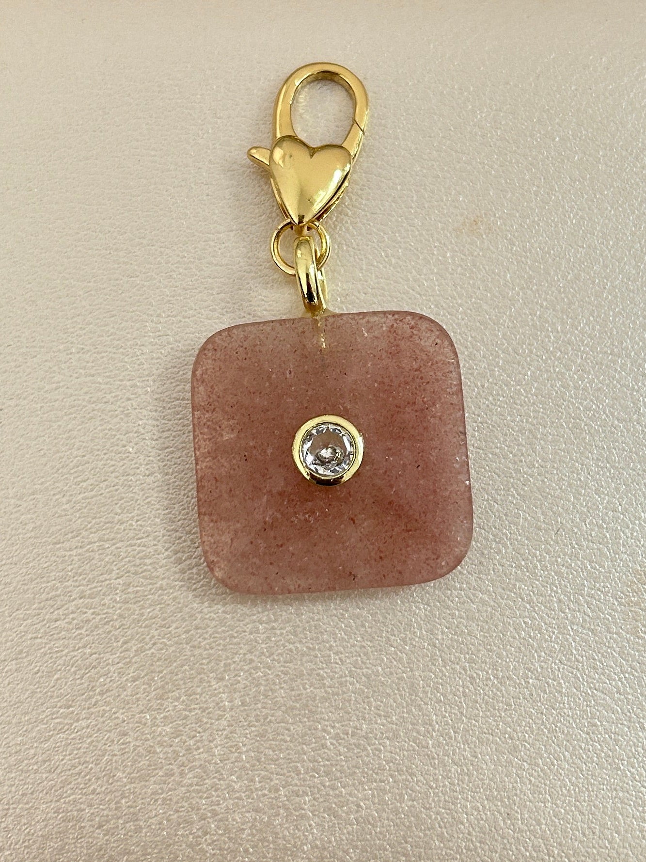 Different stone charms