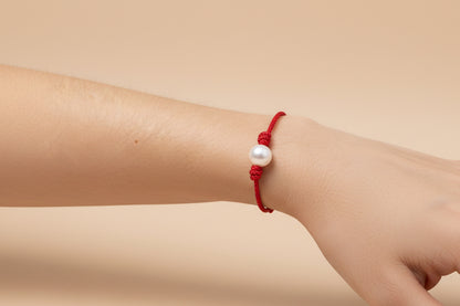Adjustable bracelet with pearl