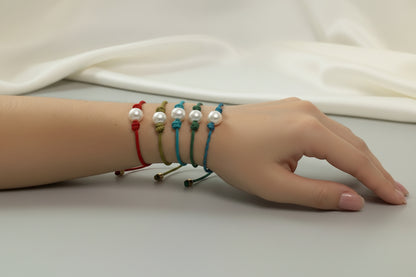 Adjustable bracelet with pearl