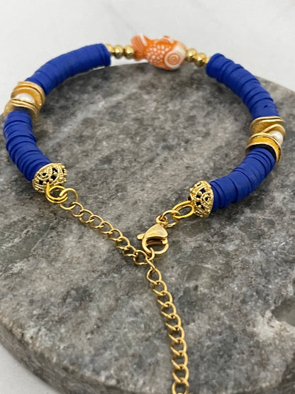 Adjustable bracelet with gold discs