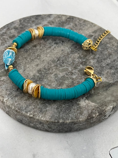 Adjustable bracelet with gold discs